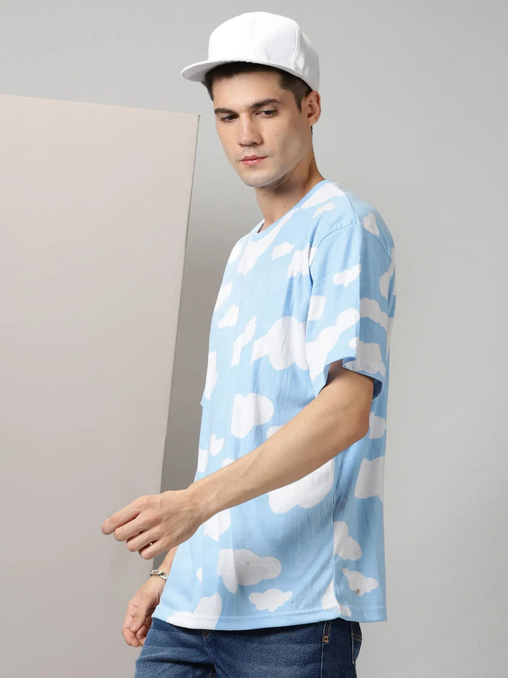 Blue With White Clouds Design Oversized T-Shirt By Rodzen