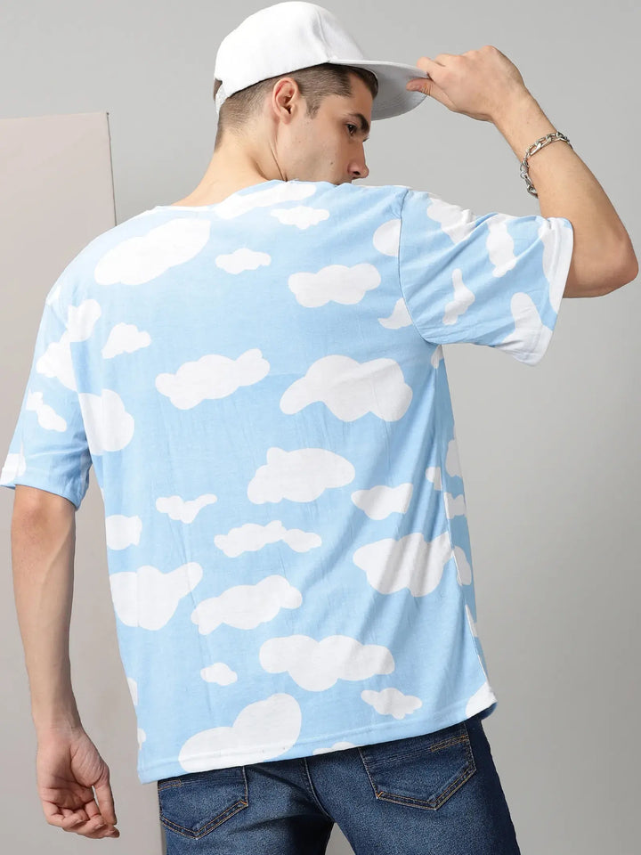 Blue With White Clouds Design Oversized T-Shirt By Rodzen