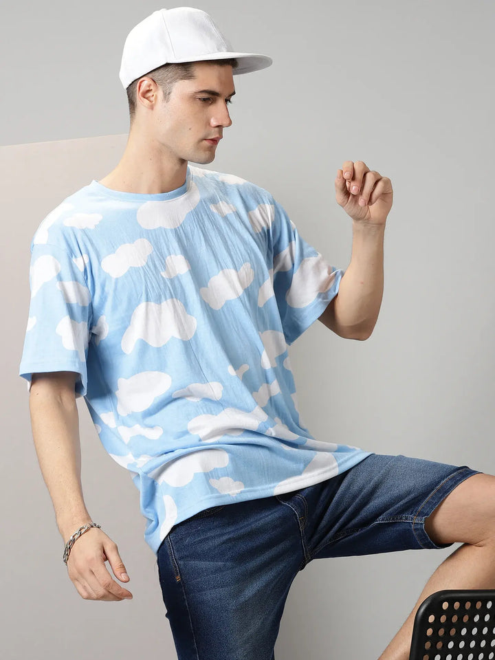 Blue With White Clouds Design Oversized T-Shirt By Rodzen