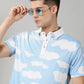 Blue With White Clouds Design Polo T-Shirt By Rodzen