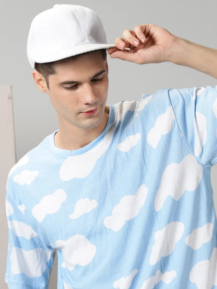 Blue With White Clouds Design Oversized T-Shirt By Rodzen